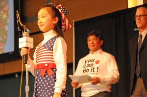 Lena Hou - Singing the US national anthem.